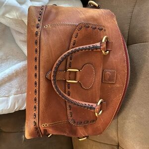 Vintage Dooney & Bourke Florentine Leather Pocket satchel in tan. Lightly used
